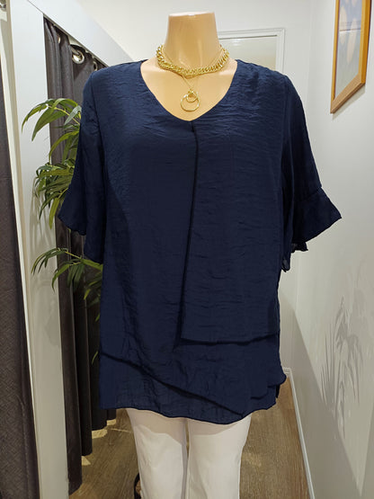 Navy blue Split Top on a mannequin with in the Boo Boo's Store